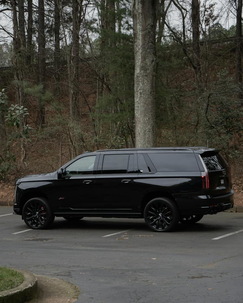 Black Cadillac Escalade side profile